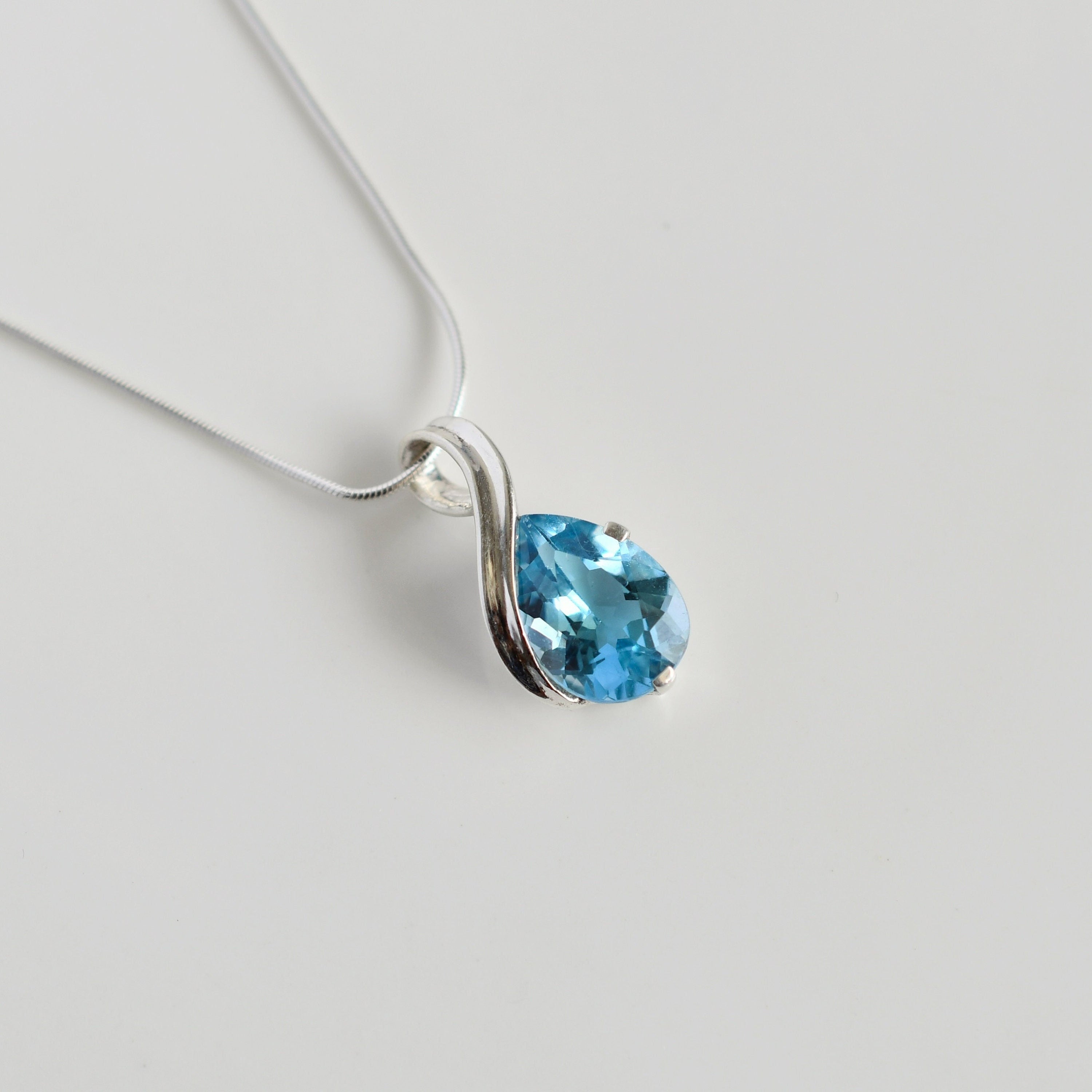 Pear Blue Topaz Pendant in 925 sterling silver