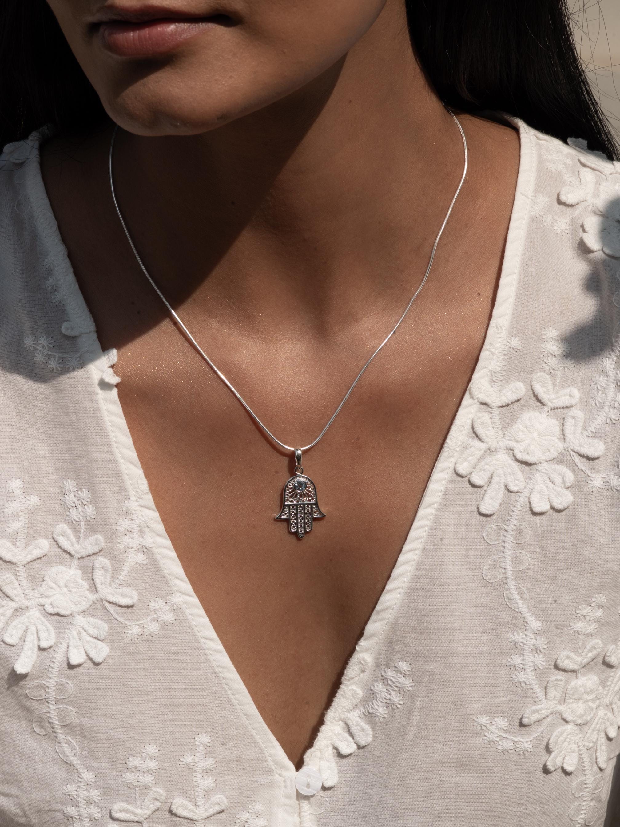 Hamsa Blue Topaz Necklace
