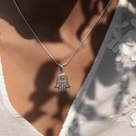 Hamsa Blue Topaz Necklace