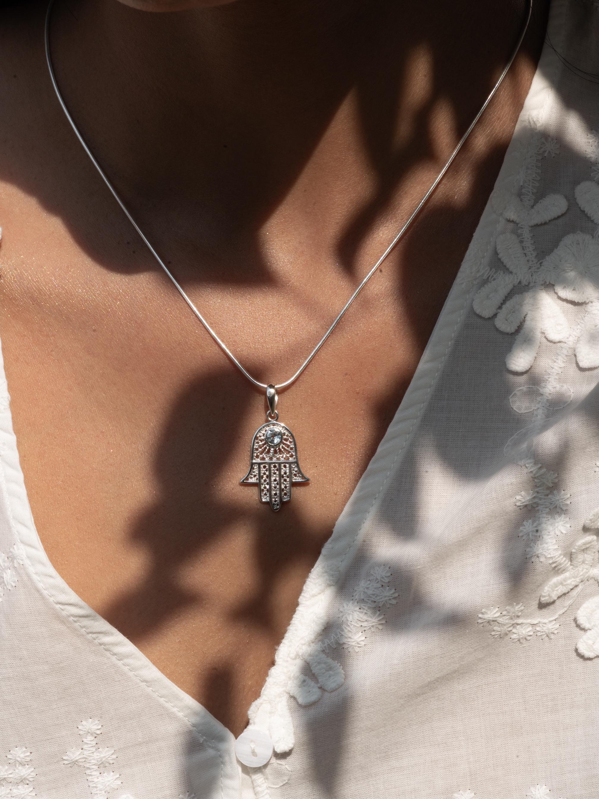 Hamsa Blue Topaz Necklace