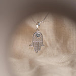 Hamsa Blue Topaz Necklace in 925 sterling silver