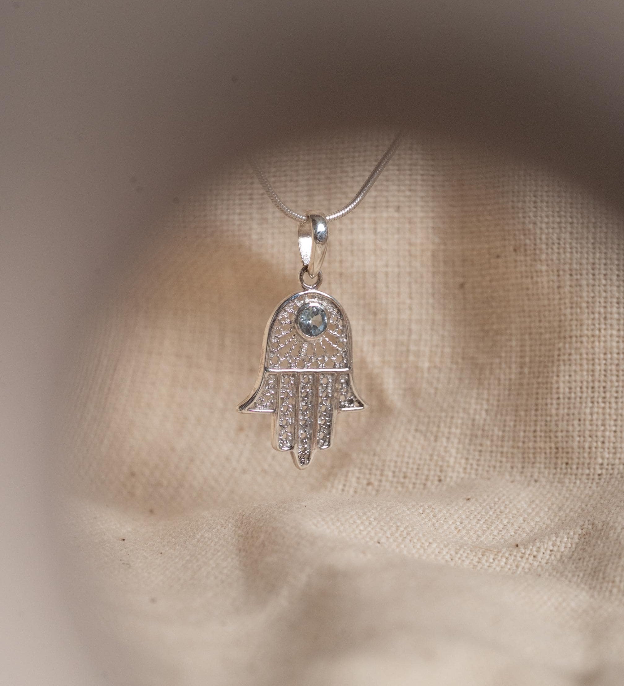 Hamsa Blue Topaz Necklace in 925 sterling silver