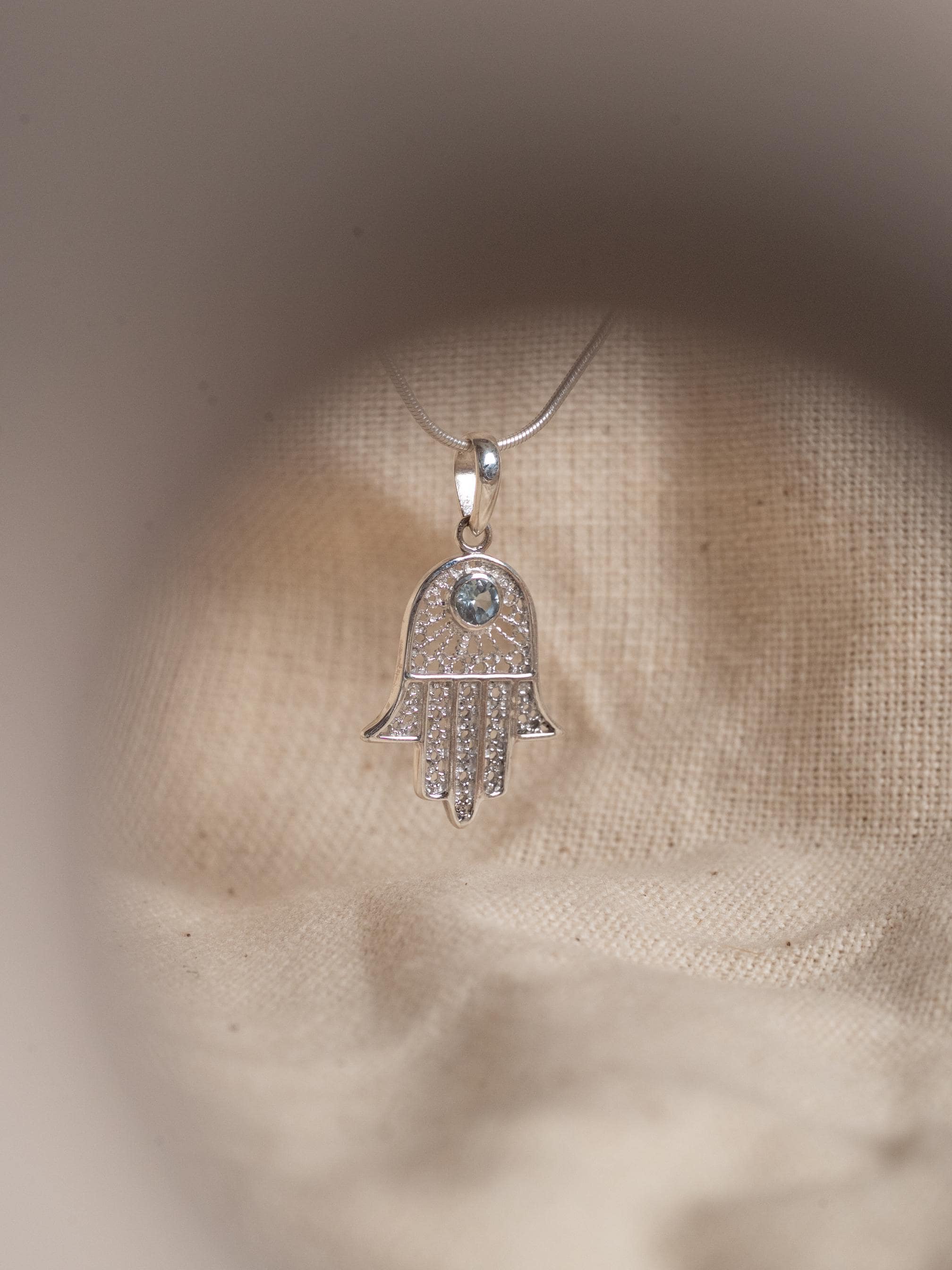 Hamsa Blue Topaz Necklace in 925 sterling silver