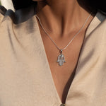 Hamsa Blue Topaz Necklace