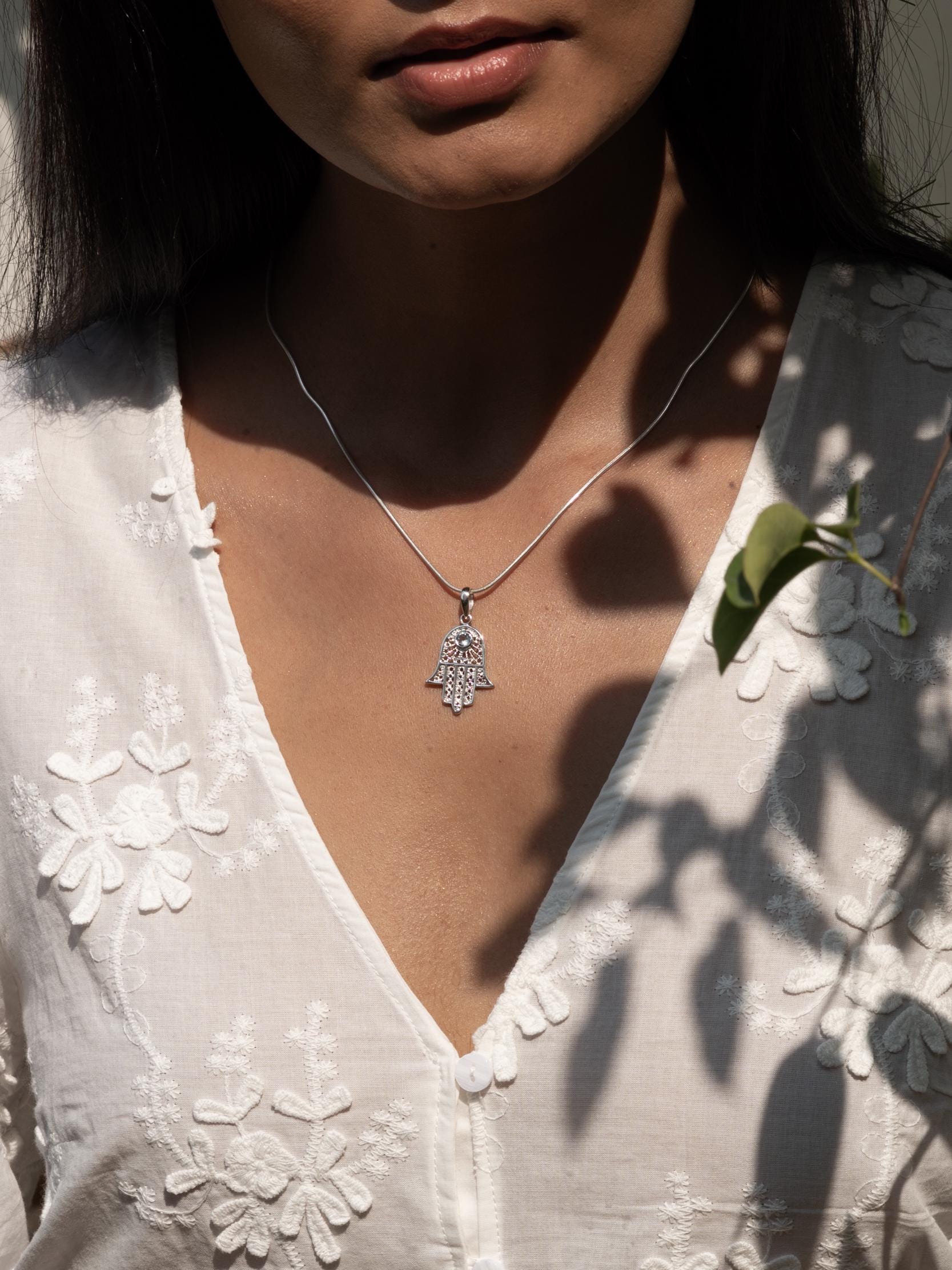 Hamsa Blue Topaz Necklace