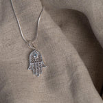 Hamsa Blue Topaz Necklace