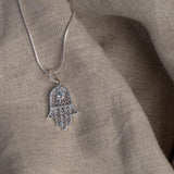 Hamsa Blue Topaz Necklace