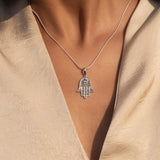 Hamsa Blue Topaz Necklace